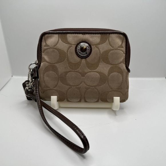 Coach Handbags - Coach brown and tan wristlet